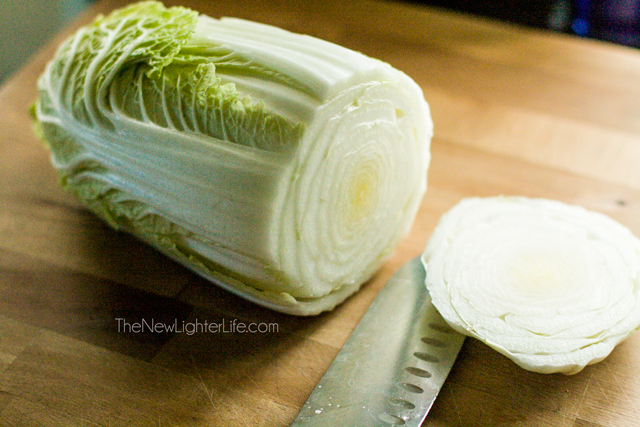 Cut bottom off Napa cabbage head.