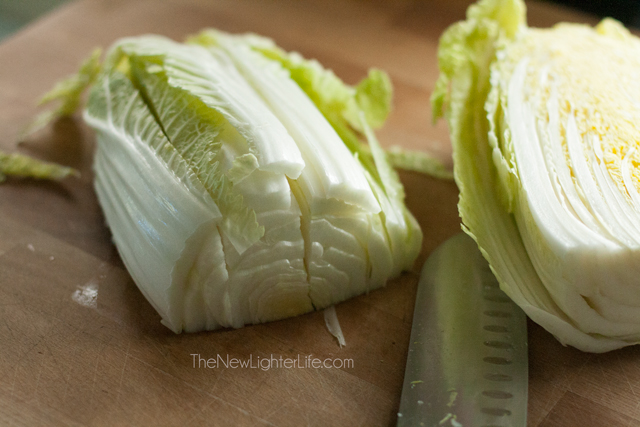 Cut strips down length of napa cabbage head