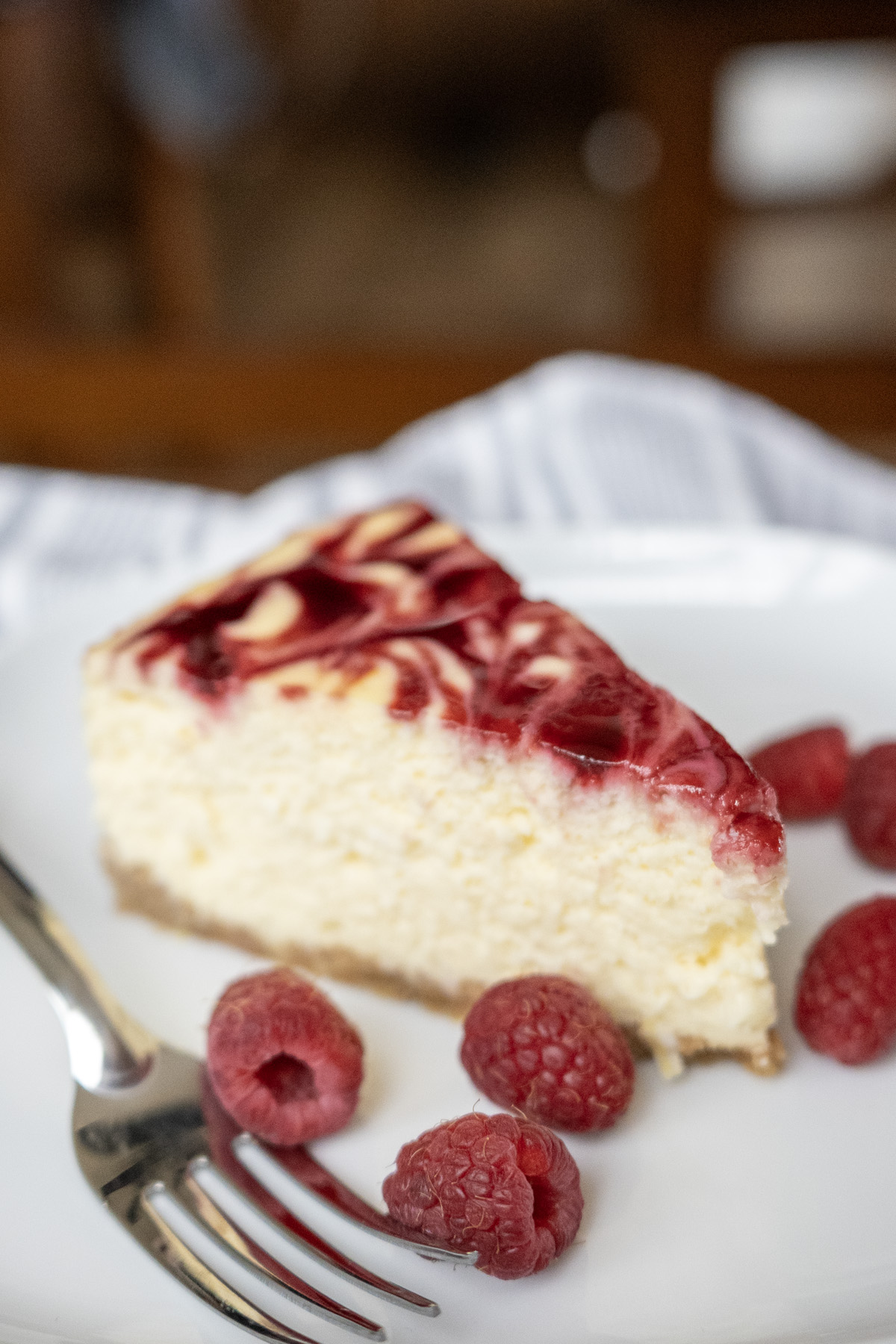 profile of lemon raspberry cheesecake slice